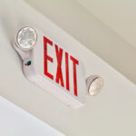 A,Red,Exit,Sign,With,Emergency,Lights,Shows,Above,A