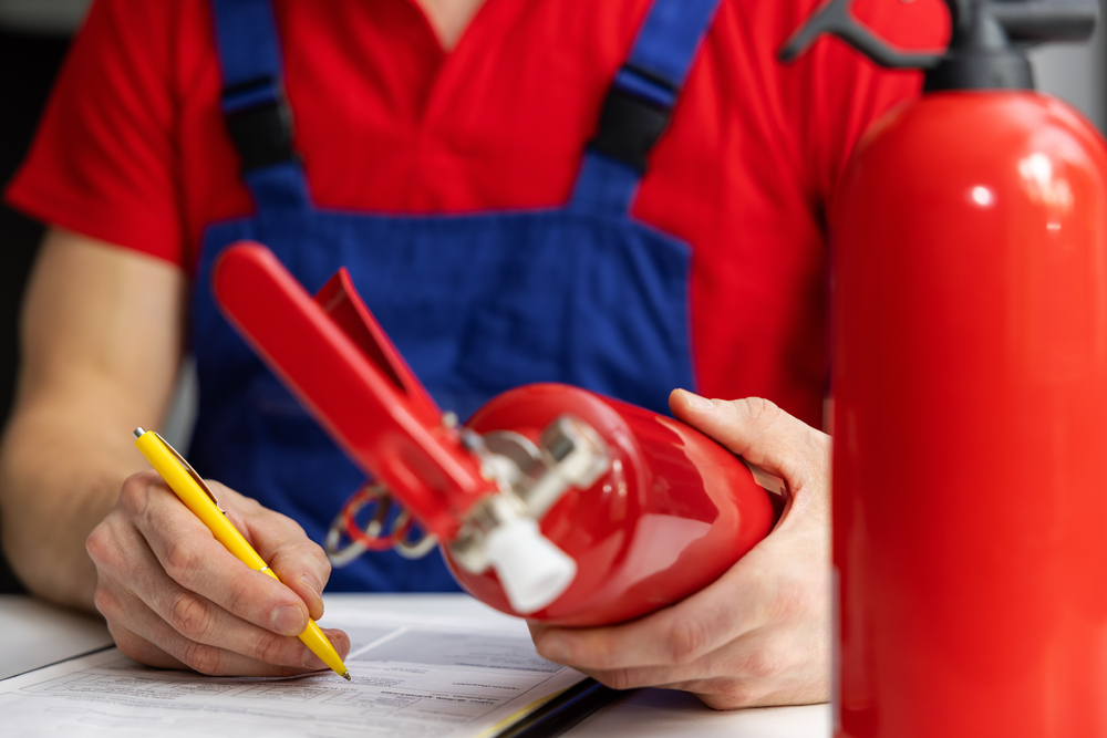Fire,Safety,Equipment,Maintenance,-,Service,Engineer,Checking,Extinguisher,Condition