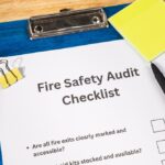 Fire,Safety,Audit,Checklist,Paper,On,Wooden,Desk,With,Pen