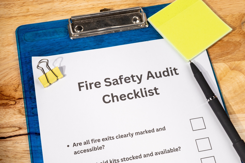 Fire,Safety,Audit,Checklist,Paper,On,Wooden,Desk,With,Pen